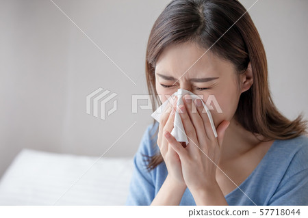 woman has running nose 57718044