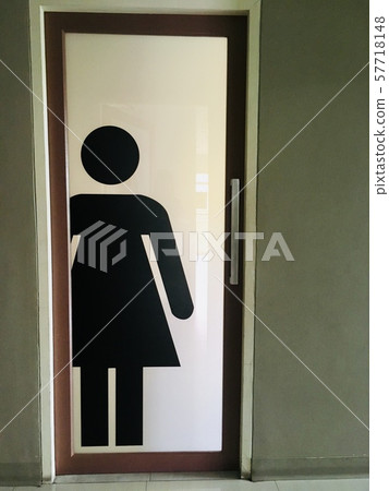 Women Restroom symbol on the door, female sign for rest room 57718148