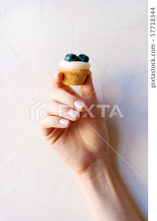 manicure and cake in the hands manicure and cake in the hands 57718344