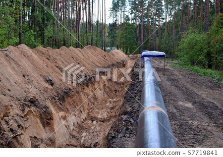 dug trench in the ground for the installation and installation of industrial gas dug trench in the ground for the installation and installation of industrial gas 57719841