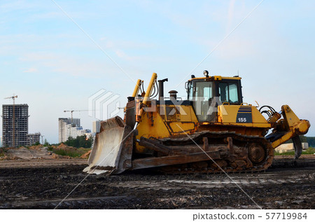 Track-type bulldozer, earth-moving equipment. Land clearing, grading, pool excavation,  57719984