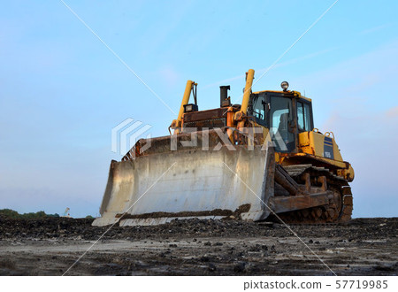 Track-type bulldozer, earth-moving equipment. Land clearing, grading, pool excavation,  57719985