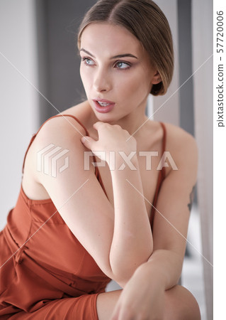 portrait of beautiful brunette woman looking at portrait of beautiful brunette woman looking at 57720006