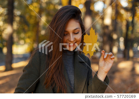 Pretty young happy woman with a smile 57720169