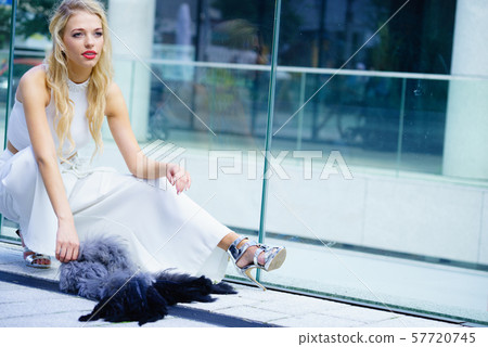 Woman wearing crop top and culottes 57720745