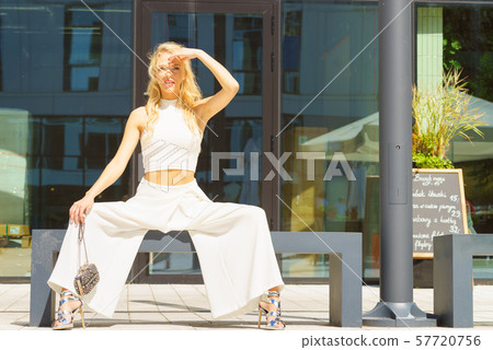 Woman wearing crop top and culottes 57720756