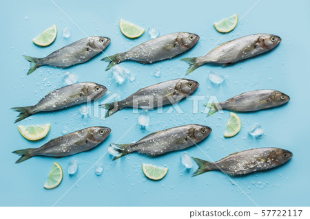 Bluefish with lemon, sea salt, lemon on blue Bluefish with lemon, sea salt, lemon on blue 57722117
