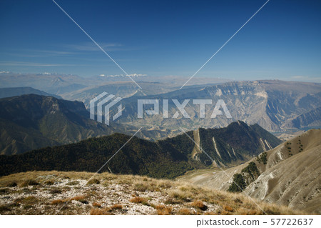 Picture of mountain terrain, blue clear sky Picture of mountain terrain, blue clear sky 57722637