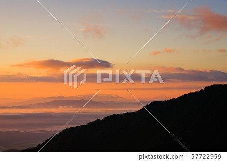 Dawn of Northern Alps and Shinkoshi Sanso (overlooking Yatsugatake and Mt. Fuji) 57722959