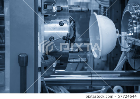 The robotics arm carry the plastic parts . The robotics arm carry the plastic parts . 57724644