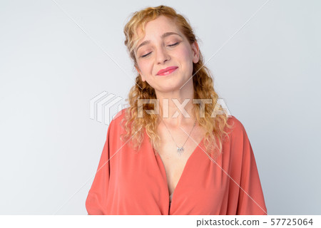 Face of beautiful blonde woman relaxing with eyes closed 57725064