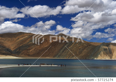 LADAKH, INDIA, July 2016, Tourist at Pangong view point LADAKH, INDIA, July 2016, Tourist at Pangong view point 57725274