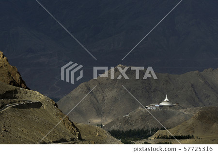 Shanti Stupa long shot, Buddhist white-domed stupa or chorten on a hilltop in Chanspa, Leh district, Ladakh, India 57725316