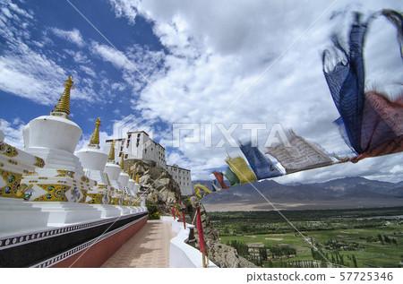 Prayer flags and Chorten or Stupas at Thiksey Monastery, Ladakh, India Prayer flags and Chorten or Stupas at Thiksey Monastery, Ladakh, India 57725346