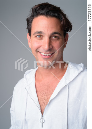 Face of happy handsome Hispanic man thinking Face of happy handsome Hispanic man thinking 57725366