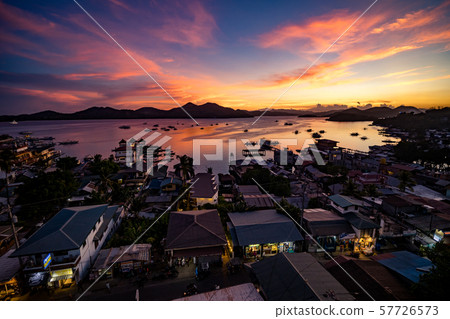 Panoramic view of a sunset over the city of Coron, Philippines 57726573