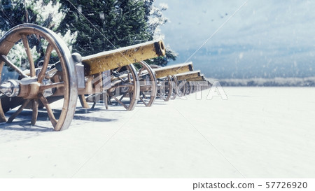 Medieval cannons in the winter field, in the snow on a cloudy day, before the battle. Falling snow 57726920