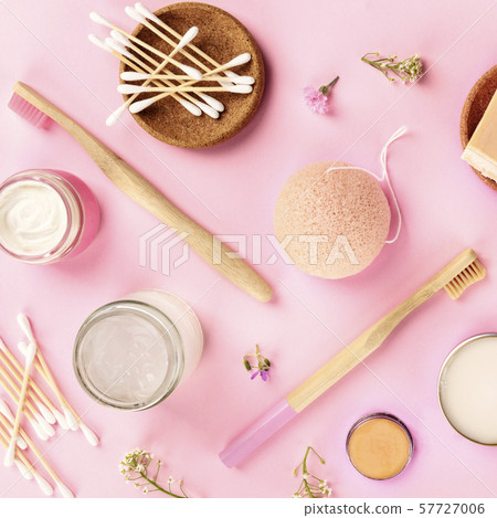 Plastic-free, zero waste cosmetics, flat lay pattern on a pink background, square image. Bamboo 57727006