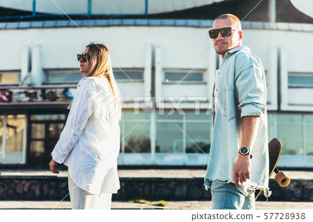 Tanned young caucasian couple, modern lovestory in film grain effect 57728938