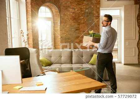 Young businessman fired, looks upset 57729072