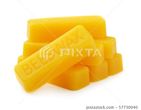 Bars of natural beeswax are isolated on a white background. Beekeeping products. Natural yellow 57730040
