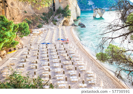 Mattinata Faraglioni stacks and beach coast of Mergoli, Vieste Gargano, Apulia, Italy. Mattinata Faraglioni stacks and beach coast of Mergoli, Vieste Gargano, Apulia, Italy. 57730591