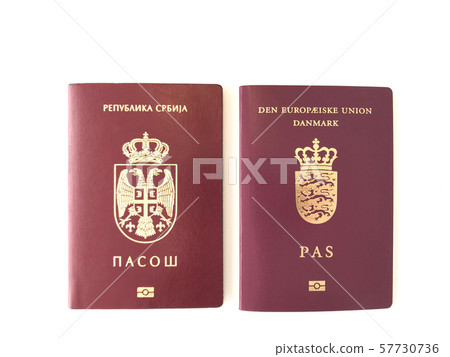 Serbian and Danish Passports on the white background Serbian and Danish Passports on the white background 57730736