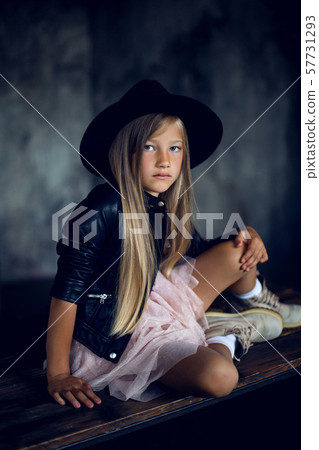 fashionable girl model in a leather jacket skirt and shoes fashionable girl model in a leather jacket skirt and shoes 57731293