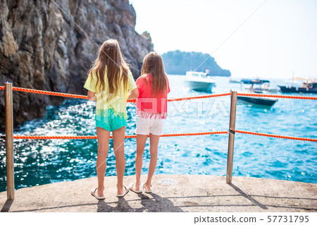 Little girls in Emerald Grotto, Amalfi Coast Little girls in Emerald Grotto, Amalfi Coast 57731795