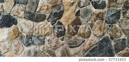 The stone wall texture pattern background. 57731933