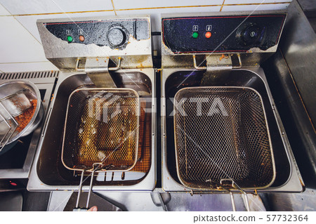Used dirty iron pan with oil and dirty turner and space for write wording, bad cooking behavior 57732364
