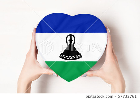 Flag of Lesotho on a heart shaped box in a female Flag of Lesotho on a heart shaped box in a female 57732761