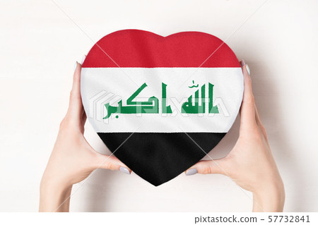 Flag of Iraq on a heart shaped box in a female Flag of Iraq on a heart shaped box in a female 57732841