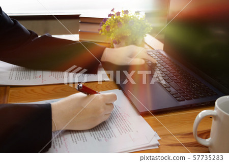 editing blur text on desk in office editing blur text on desk in office 57735283