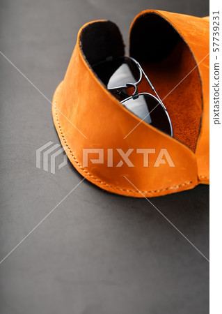 Brown case wallet for glasses made of genuine 57739231