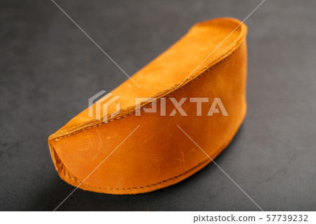 Brown case wallet for glasses made of genuine 57739232