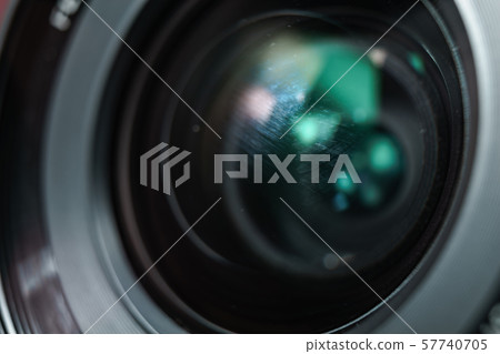 Close up dust and peel on a camera lens  57740705