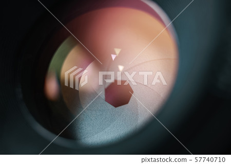 Beautiful camera lens with yellow and pink light Beautiful camera lens with yellow and pink light 57740710