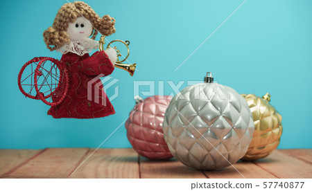 Beautiful Christmas bauble angel toy on a  and 57740877