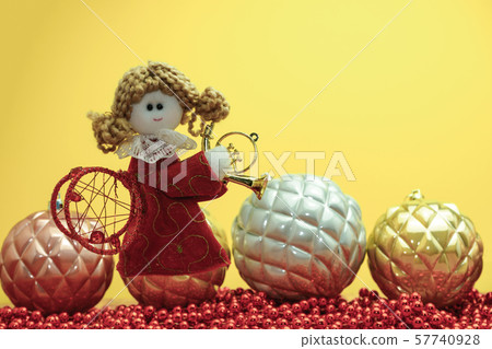 Beautiful Christmas bauble angel toy on a and Beautiful Christmas bauble angel toy on a and 57740928