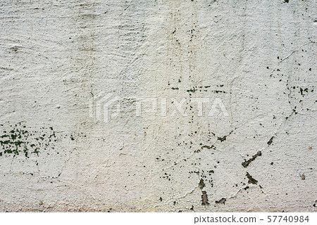 Texture of a concrete wall with cracks and scratches Texture of a concrete wall with cracks and scratches 57740984