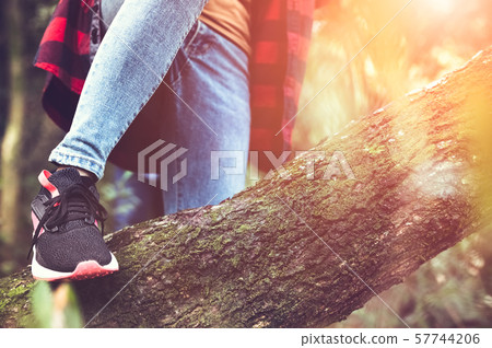 Closeup of female traveler legs and team group 57744206