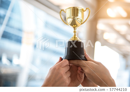 Champion golden trophy for winner with sport Champion golden trophy for winner with sport 57744210