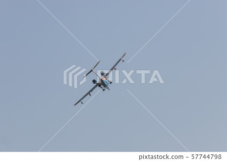 A colorful military fighter jet flying in the sky A colorful military fighter jet flying in the sky 57744798