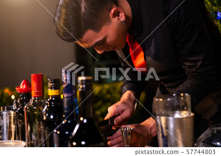 Professional bartender preparing fresh juice 57744803