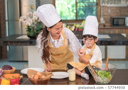 Happy beautiful Asian woman and cute little boy 57744930