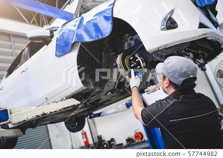 Asian male car technician car maintenance for Asian male car technician car maintenance for 57744982