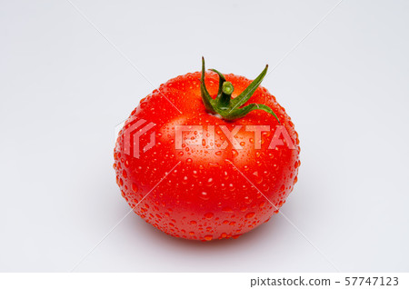 Tomato isolated on white water drops 57747123