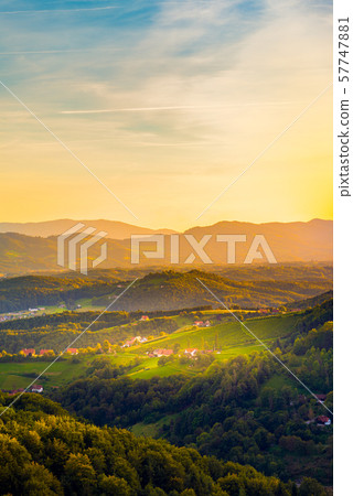 Colorfull landscape of sunset at vineyards in Austrian countryside in town Kitzeck im Sausal Colorfull landscape of sunset at vineyards in Austrian countryside in town Kitzeck im Sausal 57747881