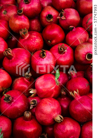 Background pattern of red ripe pomegranates in 57747993